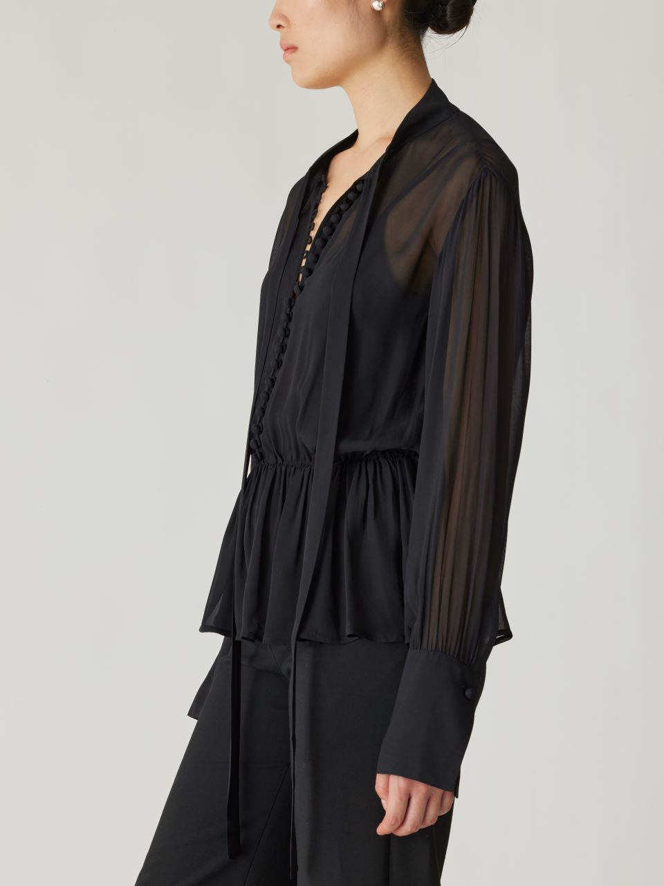 Black Tie-Neck Peplum Blouse Covered Button Tie Front Blouse in Black by Rebecca Taylor